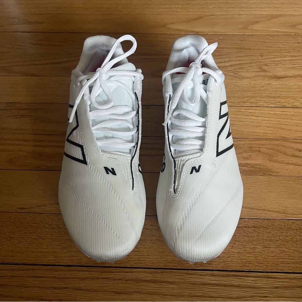 Mens New Balance lacrosse cleats size 7.5 -like new